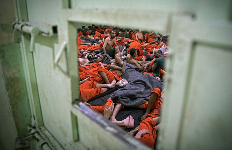 Men, suspected of being affiliated with the IS group, in a prison cell on 26 October 2019. Photo taken by Fadel Senna / AFP